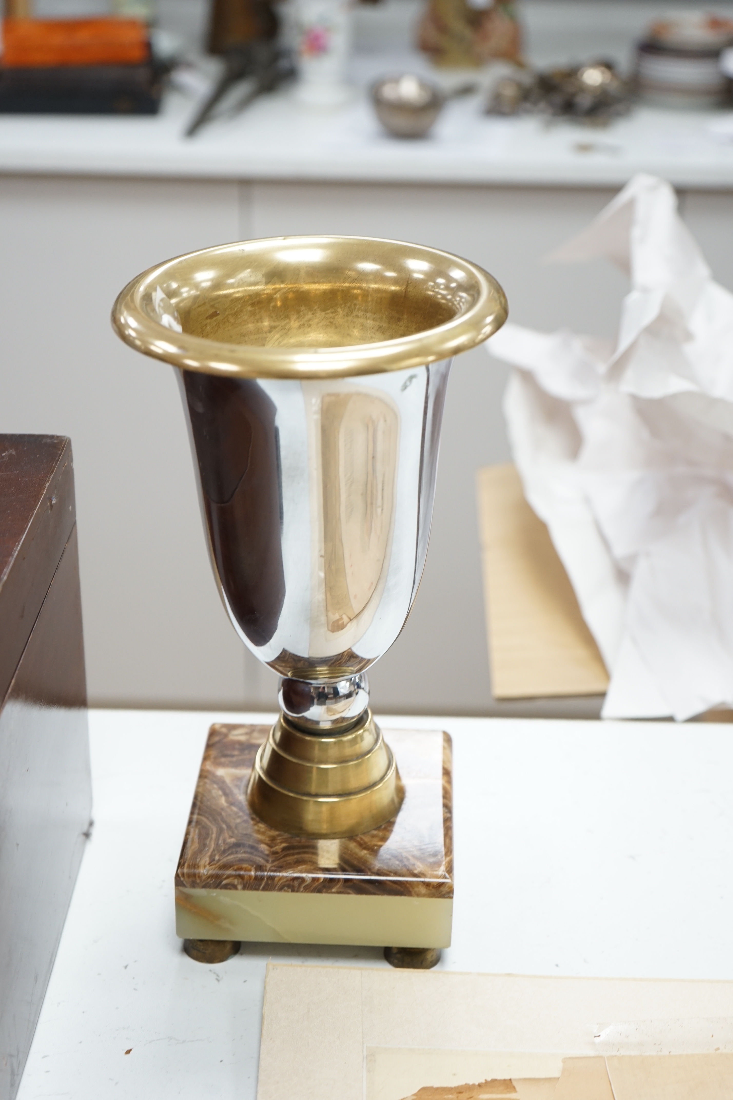 A French chrome, bronze and marble Art Deco 4 glass clock with two pedestal vase garnitures and a Wolf mount, attributed to Michel Decoux